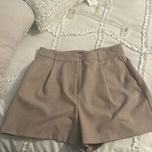 Beige trouser shorts, high rise mid length